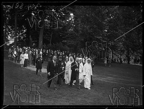 Roger-Viollet | 292683 | Albert Lebrun (1871-1950), President of the French Republic, Mohammed V of Morocco (1909-1961), Sultan of Morocco, and Si Kaddour ben Ghabrit (1868-1954), founder of the Muslim Institute of the Great Mosque of Paris, attending a garden party at the Elysee Palace. Paris (8th arrondissement), on June 2nd, 1939. Photograph from the collections of the newspaper  Excelsior . | &copy; Excelsior - L'Equipe / Roger-Viollet