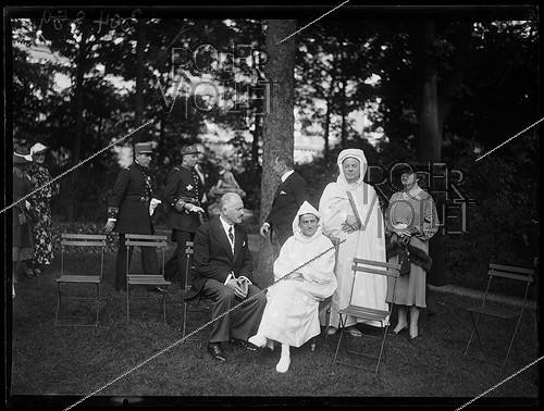 Roger-Viollet | 520145 | Albert Lebrun (1871-1950), President of the French Republic, Mohammed V of Morocco (1909-1961), Sultan of Morocco, and Si Kaddour ben Ghabrit (1868-1954), founder of the Muslim Institute of the Great Mosque of Paris, attending a garden party at the Elysee Palace. Paris (8th arrondissement), on June 2nd, 1939. Photograph from the collections of the newspaper  Excelsior . | &copy; Excelsior - L'Equipe / Roger-Viollet