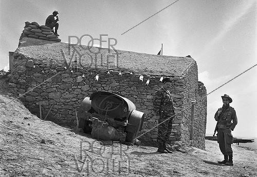 Roger-Viollet | 576394 | Algerian War of Independence. The French Army's fort at M'Zaourat, Mascara Region. This fort included a platoon of 48 harkis. It was built by the disciplinary unit of the 1st Regiment of the Foreign Legion (based in Sidi Bel Abbès). Algeria, Summer 1961. | &copy; Jean-Pierre Laffont / Roger-Viollet