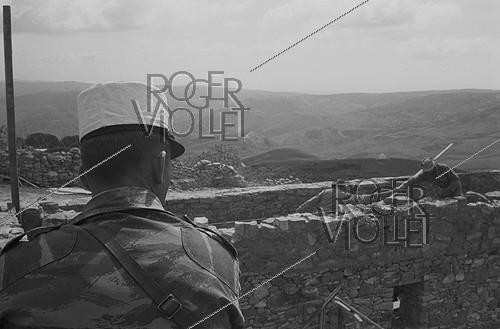 Roger-Viollet | 664005 | Algerian War of Independence. The French Army's fort at M'Zaourat, Mascara Region. This fort included a platoon of 48 harkis. It was built by the disciplinary unit of the 1st Regiment of the Foreign Legion (based in Sidi Bel Abbès). Algeria, Summer 1961. | &copy; Jean-Pierre Laffont / Roger-Viollet