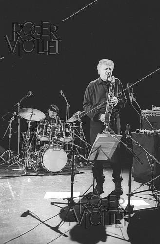 Roger-Viollet | 1446256 | Bernard Lubat (born in 1945), French jazz musician, and Michel Portal (1935-2026), French composer and musician, during a concert, on January 9, 1998. | &copy; Christian Rose / Roger-Viollet