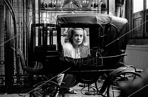 Roger-Viollet | 1644016 | Catherine Deneuve (born in 1943), French actress, at Hermès, 24 Faubourg Saint-Honoré, Paris (8th arrondissement), circa 1960. Photograph by Philippe R. Doumic (1927–2013). | &copy; Philippe R. Doumic / Roger-Viollet
