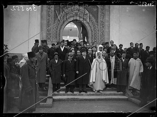 Roger-Viollet | 492184 | Celebrating the Eid al-Adha at the Great Mosque of Paris (religious ceremony where a sheep is sacrificed), with Mahmoud Fakhry Pasha (1884-1952), Ambassador of Egypt in France, Si Kaddour ben Ghabrit, wearing the burnous (1868-1954), Algerian senior official and founder of the Muslim Institute of the Great Mosque of Paris, and Galandou Diouf (1875-1941), Senegalese deputy. Paris (5th arrondissement), 31 January 1939. Photograph from the French newspaper  Excelsior . | &copy; Excelsior - L'Equipe / Roger-Viollet