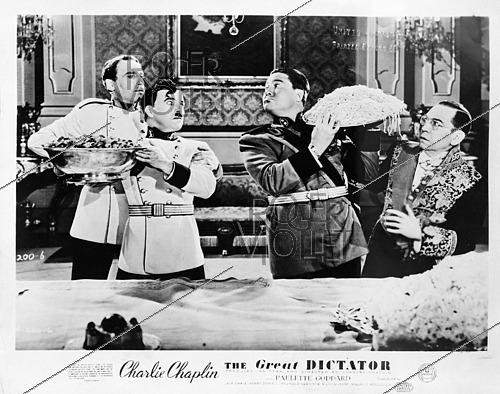 Roger-Viollet | 1421810 | Charlie Chaplin (1889-1977), British actor and producer, filming The Great Dictator, April 1945. Photograph from the collections of the French newspaper  France-Soir . Bibliothèque historique de la Ville de Paris. | &copy; Fonds France-Soir / BHVP / Roger-Viollet