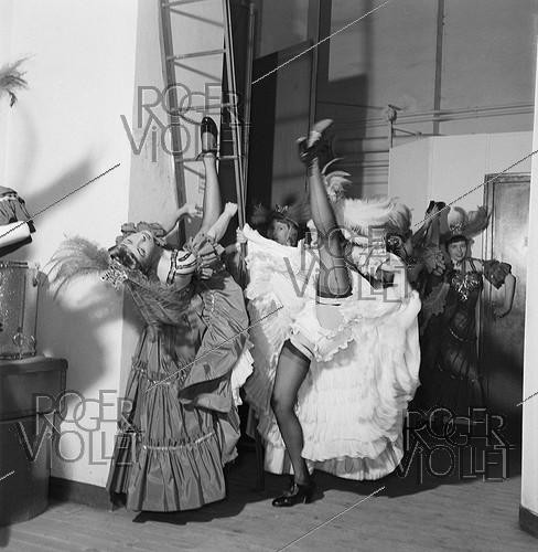 Roger-Viollet | 851670 | French Cancan dancers at the Moulin Rouge. Paris, 1950's. Photograph by Janine Niepce (1921-2007). | &copy; Janine Niepce / Roger-Viollet