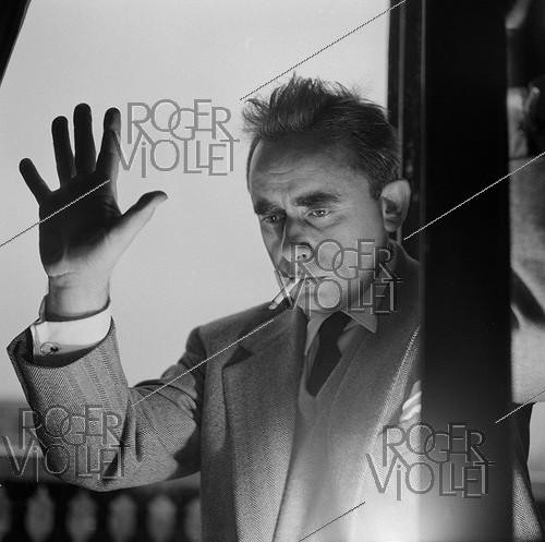 Roger-Viollet | 849572 | Henri-Georges Clouzot (1907-1977), French director. Paris, circa 1955. | &copy; Gaston Paris / Roger-Viollet