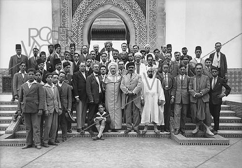Roger-Viollet | 287223 | Inauguration of the Paris Mosque. Ben Ghabrit among a group of Tunisian students. Paris (5th arrondissement). July 15, 1926. | &copy; Albert Harlingue / Roger-Viollet