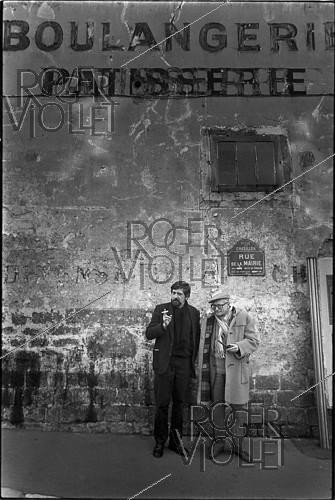 Roger-Viollet | 1410546 | Jacques Tardi (born in 1946), French comic artist, and Léo Malet (1909-1996), French writer and poet. 1991. | &copy; Irmeli Jung / Roger-Viollet