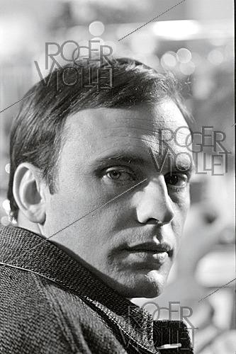 Roger-Viollet | 1644117 | Jean-Louis Trintignant (1930–2022), French actor, director and racing driver, 1960s. Photograph by Philippe R. Doumic (1927–2013). | &copy; Philippe R. Doumic / Roger-Viollet