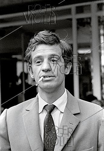 Roger-Viollet | 1643873 | Jean-Paul Belmondo (1933–2021), French actor. 1960s. Photograph by Philippe R. Doumic (1927–2013). | &copy; Philippe R. Doumic / Roger-Viollet