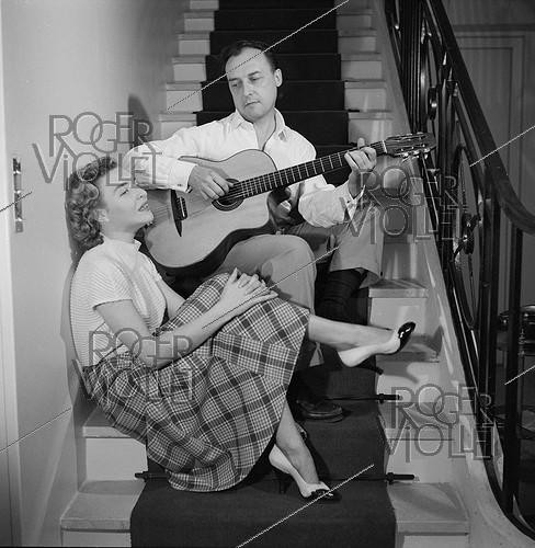Roger-Viollet | 894421 | Line Renaud (born in 1928), French singer and actress, with  Loulou  Gasté (1908-1995), French musician and composer, at the Jonchère. Rueil-Malmaison (France), circa 1955. | &copy; Gaston Paris / Roger-Viollet