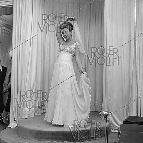 Roger-Viollet | 1323801 | Marina Vlady (1938-2026), French actress, at Pierre Balmain's (1914-1982), French couturier. Paris, October 1965. Photograph from the collections of the French newspaper  France-Soir . Bibliothèque historique de la Ville de Paris. | &copy; Fonds France-Soir / BHVP / Roger-Viollet