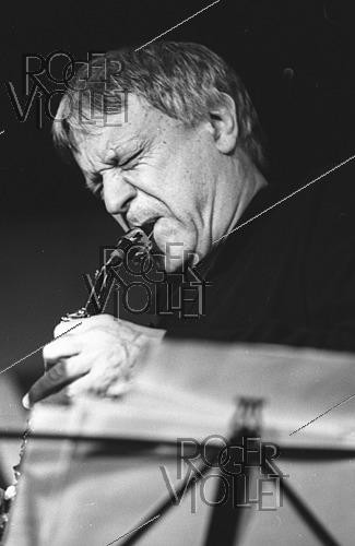 Roger-Viollet | 1472895 | Michel Portal (1935-2026), compositeur et musicien français, lors d'un concert, 14 décembre 1998. | &copy; Christian Rose / Roger-Viollet