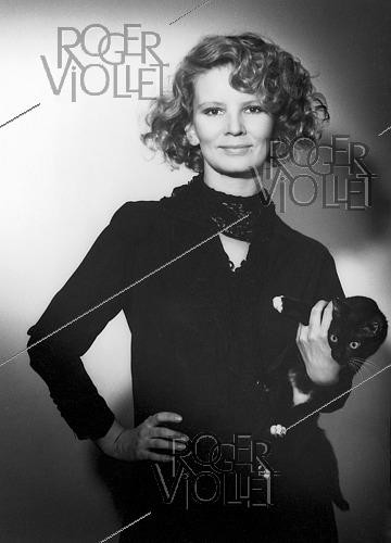 Roger-Viollet | 1410531 | Nicole Garcia (born in 1946), French actress, scriptwriter and drirector, with her black cat. 1971. | &copy; Irmeli Jung / Roger-Viollet