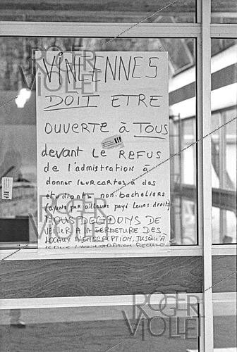 Roger-Viollet | 1438132 | Posters protesting the crèche and the reopening of the faculty at Vincennes (Val-de-Marne), January 13, 1969. Photograph by Daniel Lapied. Fonds France-Soir. Bibliothèque historique de la Ville de Paris. | &copy; Daniel Lapied / Fonds France-Soir / BHVP / Roger-Viollet