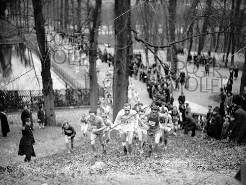 Roger-Viollet | 1421980 | Raphaël Pujazon (1918-2000) and Ernest Petitjean, French long-distance and middle-distance athletes at the French cross-country championships. France, 1945. France Soir collection. Bibliothèque historique de la Ville de Paris. | &copy; Fonds France-Soir / BHVP / Roger-Viollet