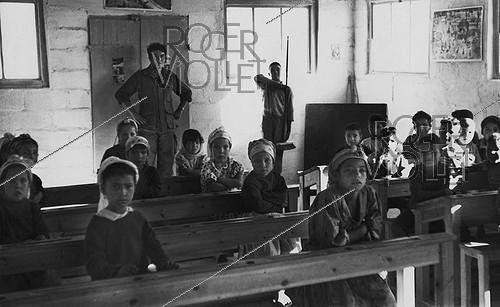 Roger-Viollet | 1035383 | School built by the soldiers for the children of the village of M'Zaourat, Mascara Area, during the Algerian War of Independence. Algeria, Summer 1961. | &copy; Jean-Pierre Laffont / Roger-Viollet