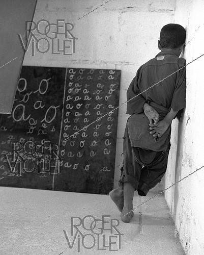 Roger-Viollet | 737985 | School built by the soldiers for the children of the village of M'Zaourat, Mascara Area, during the Algerian War of Independence. Algeria, Summer 1961. | &copy; Jean-Pierre Laffont / Roger-Viollet