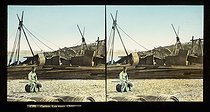 Roger-Viollet | 890252 | The docks, French soldier. Canton (China). Stereoscopic view, hand-colored at the time. Circa 1900. | &copy; Léon & Lévy / Roger-Viollet