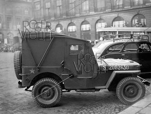 Roger-Viollet | 1421927 | World War II. Jeep equipped against cold and wind. Paris, on February 27, 1945. Photograph from the collections of the French newspaper  France-Soir . Bibliothèque historique de la Ville de Paris. | &copy; Fonds France-Soir / BHVP / Roger-Viollet