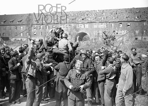 Roger-Viollet | 1421825 | World War II. Liberation of a camp of prisoners of war. Kitzingen (Germany), on April 13, 1945. Photograph from the collections of the French newspaper  France-Soir . Bibliothèque historique de la Ville de Paris. | &copy; Fonds France-Soir / BHVP / Roger-Viollet