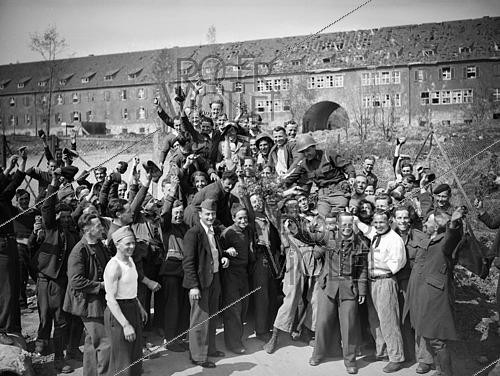 Roger-Viollet | 1421830 | World War II. Liberation of a camp of prisoners of war. Kitzingen (Germany), on April 13, 1945. Photograph from the collections of the French newspaper  France-Soir . Bibliothèque historique de la Ville de Paris. | &copy; Fonds France-Soir / BHVP / Roger-Viollet