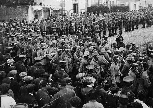 Roger-Viollet | 313181 | World War One. German prisoners guarded by English soldiers. Saint-Nazaire (France), 1914. | &copy; Maurice-Louis Branger / Roger-Viollet